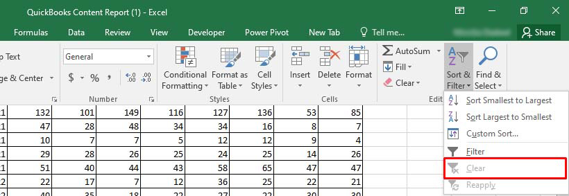 Excel: Clicking 'Sort & Filter' and selecting 'Clear' option.